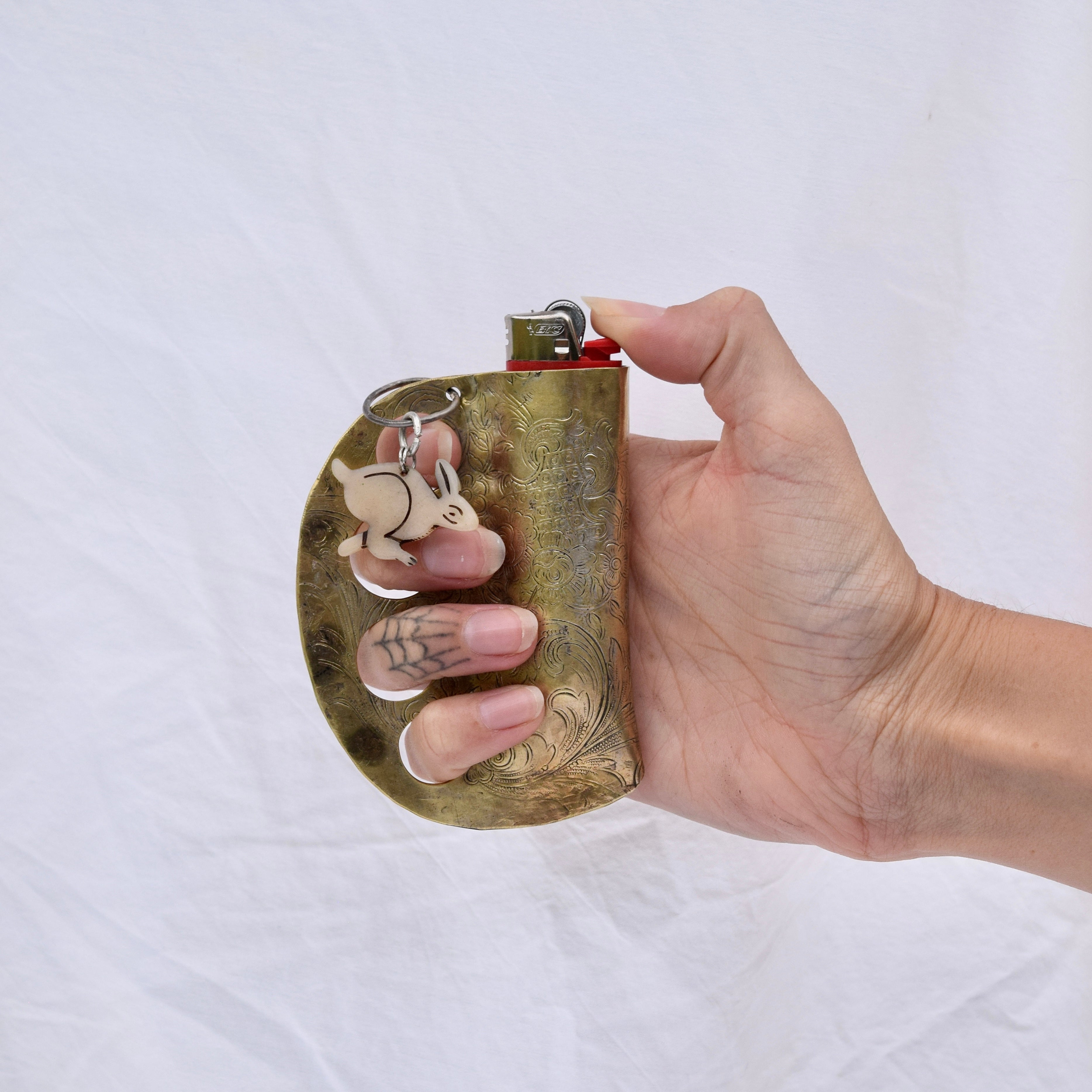Brass Knuckles But Bronze Lighter Case